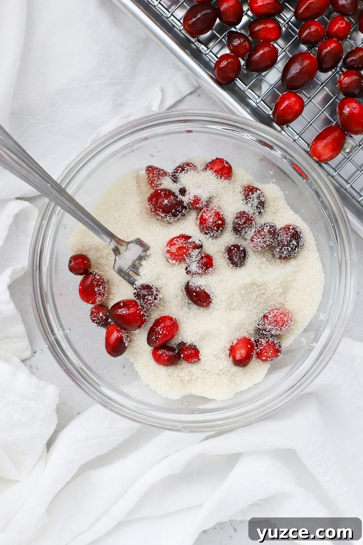 Sugared Cranberries Recipe: Simple Steps for Sparkling Cranberry Garnish 8 Rolling cranberries in sugar to make candied cranberries