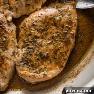 Balsamic Pan-Seared Chicken Breasts with Garlic and Herbs 7 Chicken breast in a skillet with an herb and balsamic pan sauce.