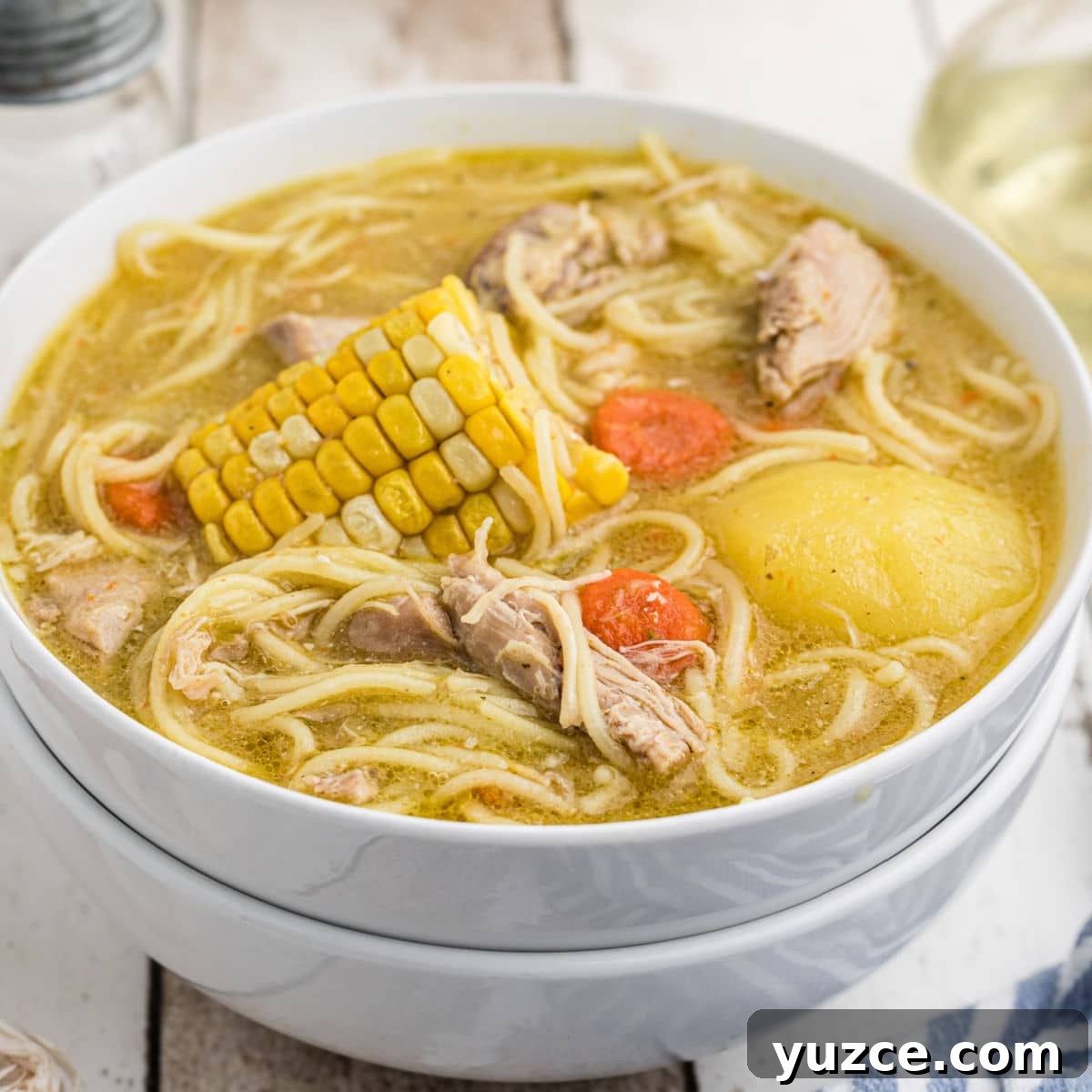 Hearty Dutch Oven Soup Recipes for Cozy Meals 16 A close up from the side of a dished up bowl of Cuban Chicken Soup.
