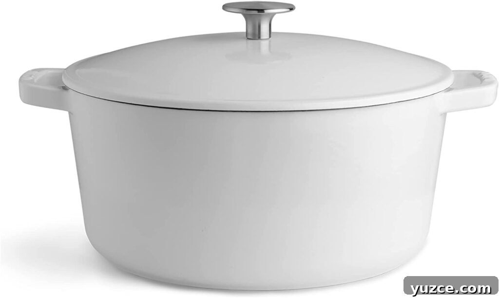 Hearty Dutch Oven Soup Recipes for Cozy Meals 3 A white Dutch oven pot with handles.