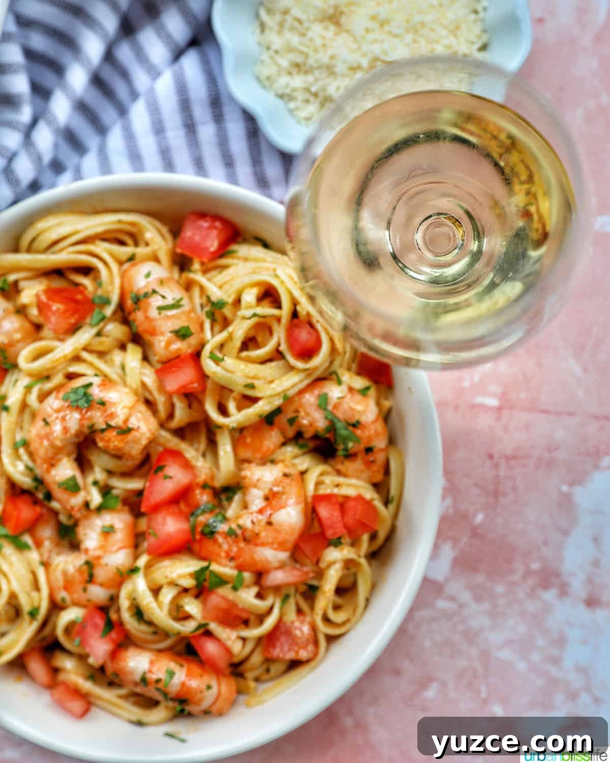 Perfect Wine Pairings for Popular Pasta Dishes 2 Cajun Shrimp Pasta with glass of white wine
