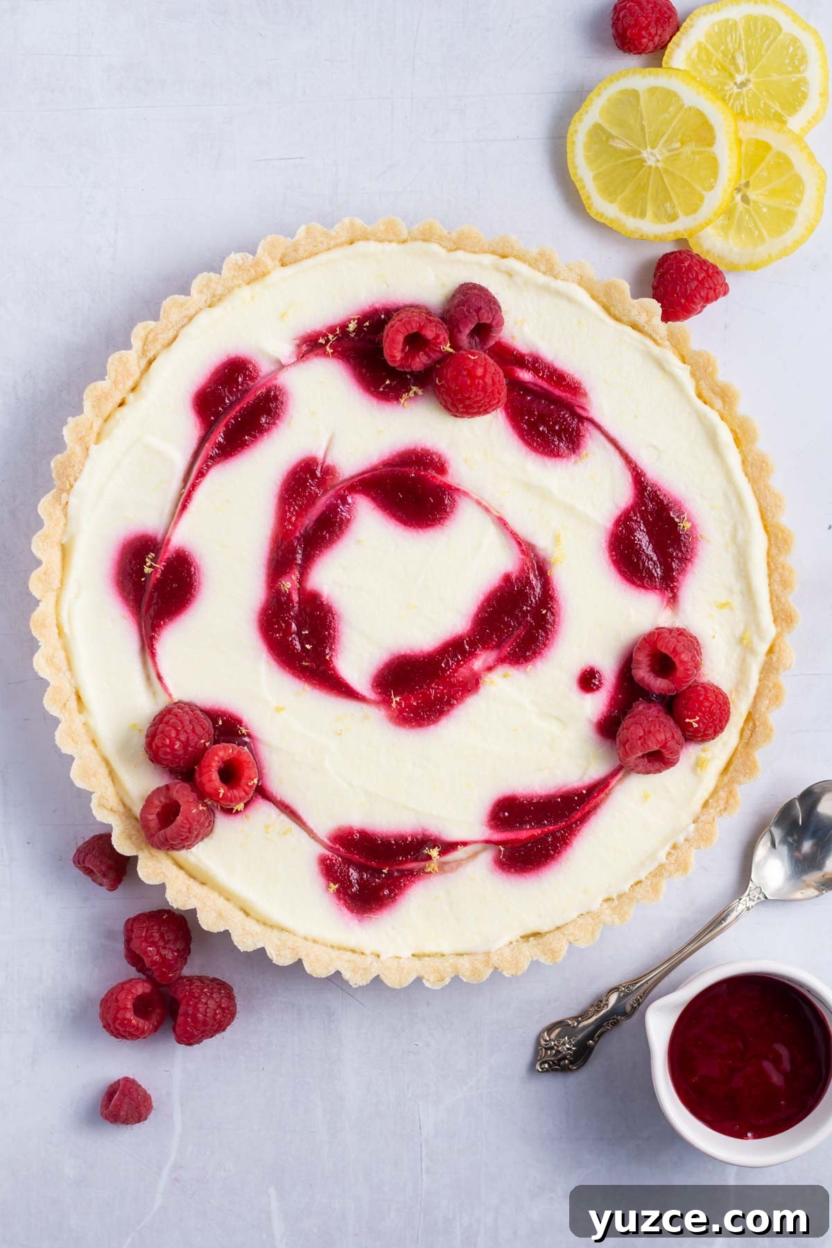Lemon Raspberry Tart Recipe with a Buttery Shortcrust 16 lemon raspberry tart with lemons and raspberry coulis