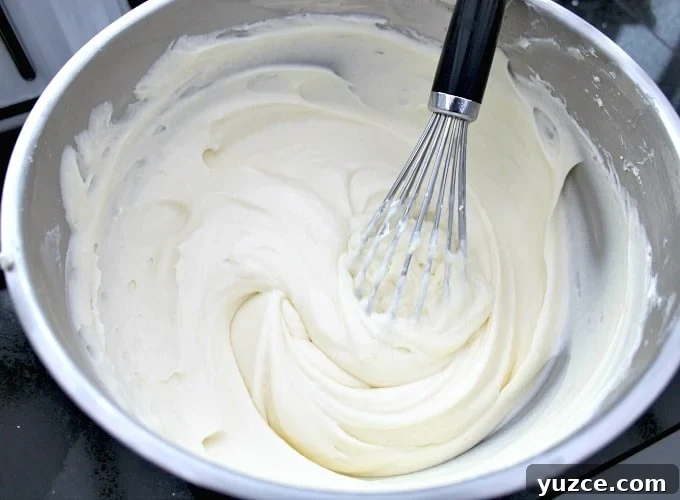 Strawberry and Vanilla Cake, adding gelatin mixture to cream Strawberry and Vanilla Cake, adding gelatin mixture to cream